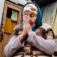 Senior Ukraine Woman Praying