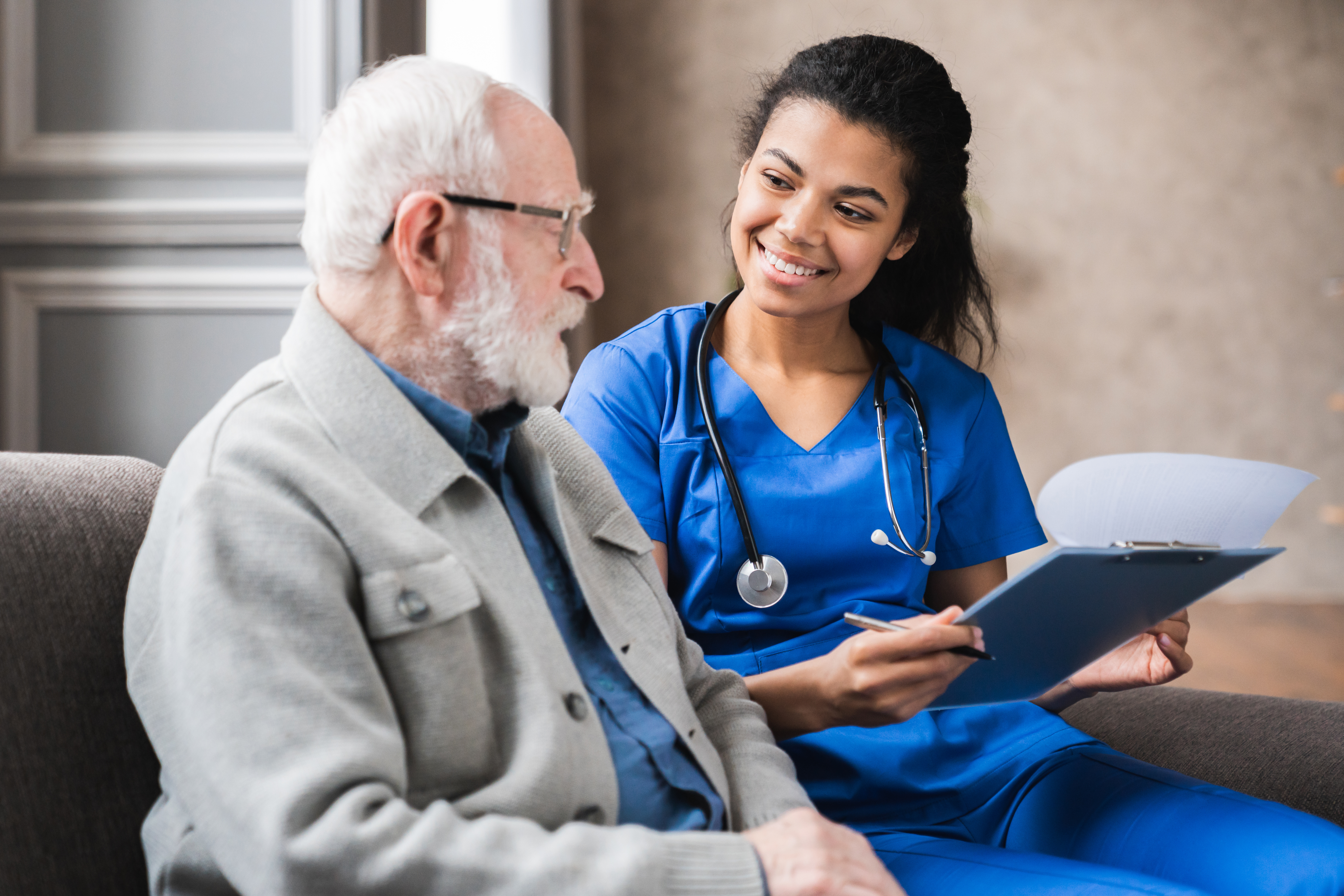 Nurse with Elderly Patient
